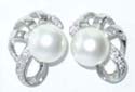 fashion earrings with white bead in front and flower pattern decor 