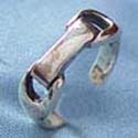 sterling silver ring with rectangular shape with circle knot on each side