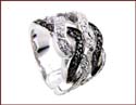 sterling silver ring with blace and white curve pattern design