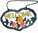 great welcome board design with some flowers and the big words "WELCOME" in the center of the board