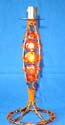 long orange bead candle holder