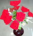 blood red rose with mini white flower design
